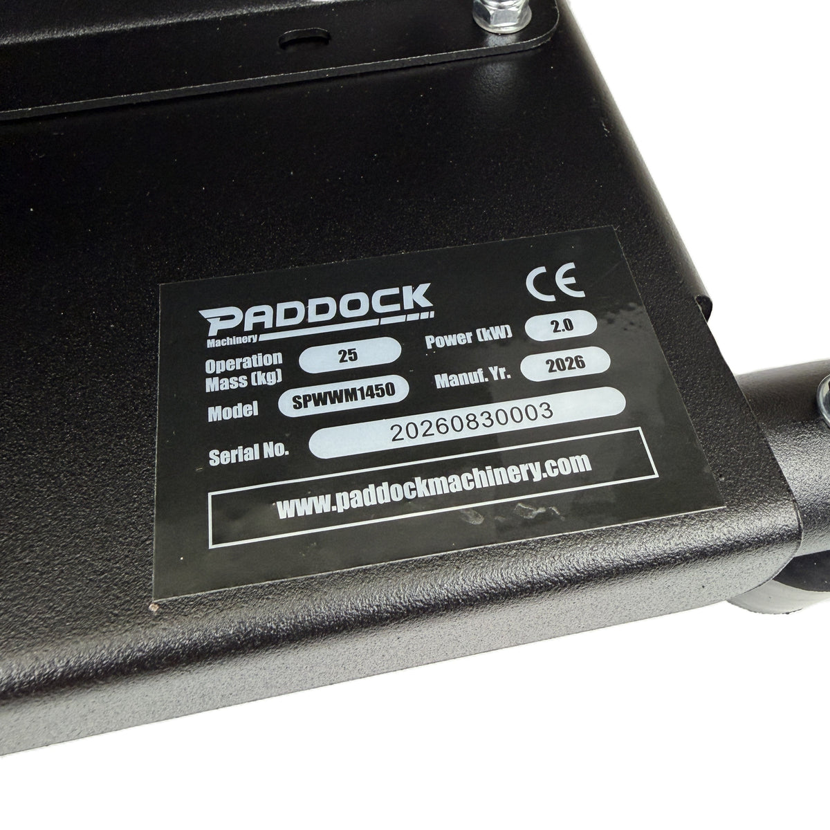 Black metal base for a Paddock™ 1,450 PSI Wall Mountable Pressure Washer, featuring a label with model number SPWM1450, serial number 20260830003, and technical specifications.